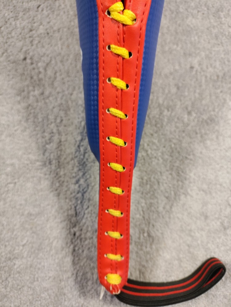 AAMA Double kicking target pad for speed kick training. Nylon strap handle.