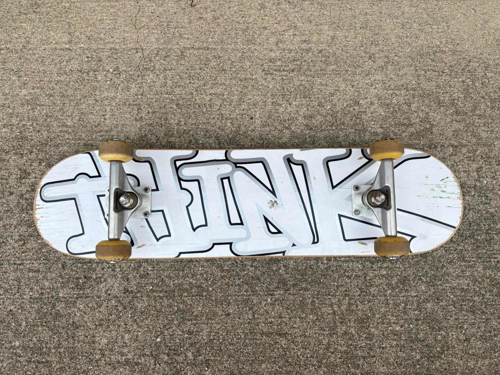 THINK "SPRAY TAG" SKATEBOARD Complete Silver White Royal Trucks