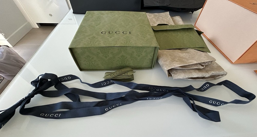empty designer boxes - Chanel, Gucci, And Louis Vuitton. Various sizes