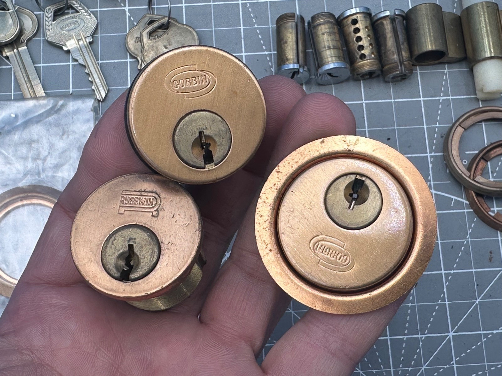 LOCKSMITH LOT - 14 CYLINDERS (SHLAGE, CORBIN, RUSSWIN) AND 7 PLUGS