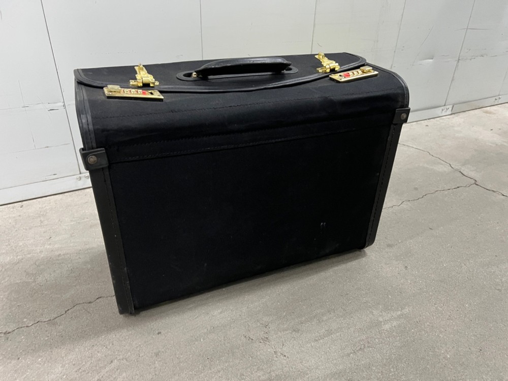 Black Briefcase, snap closure with 3 digit combo lock