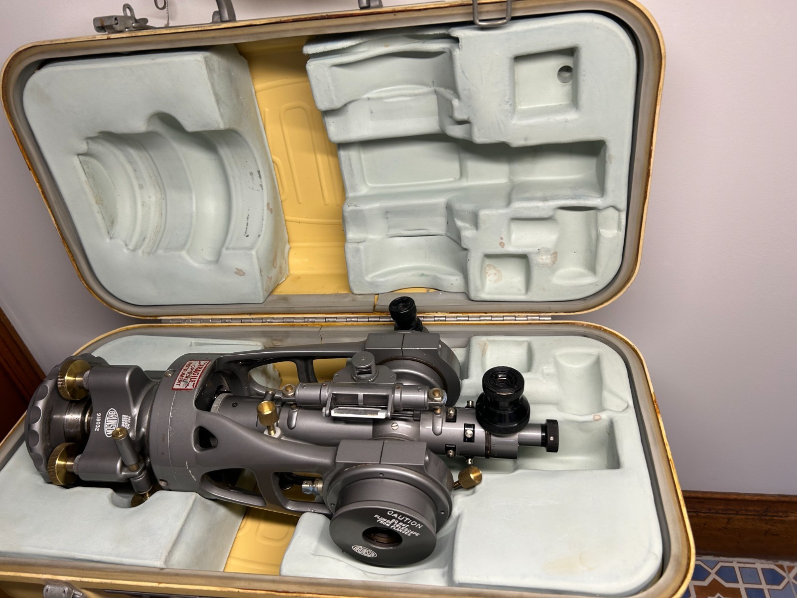 Brunson transit 76-RH with right angle eye piece,light source & tripod