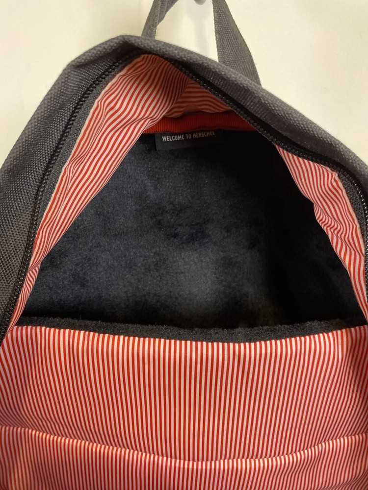 Herschel Black Backpack with Brown Suede Bottom