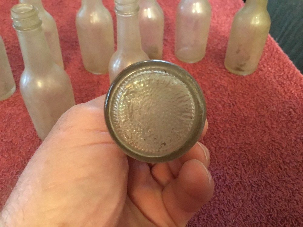 9 Miniature Wiskey Bottles