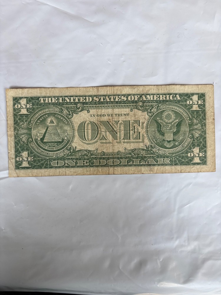 1957 A $1 silver certificate banknote AU