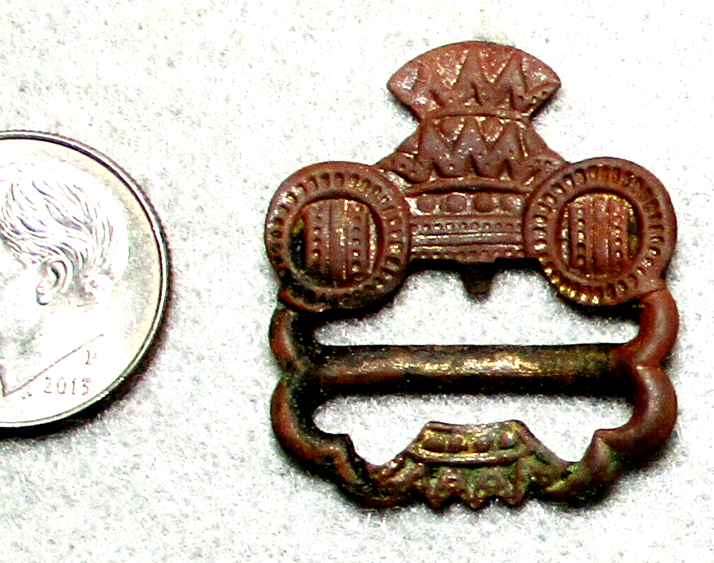 An Elegant Copper Hat Badge/Slide with a Crown & Other Heraldic symbols