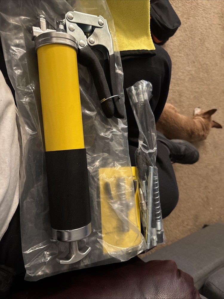 Brand New Yellow Grease Gun Kit