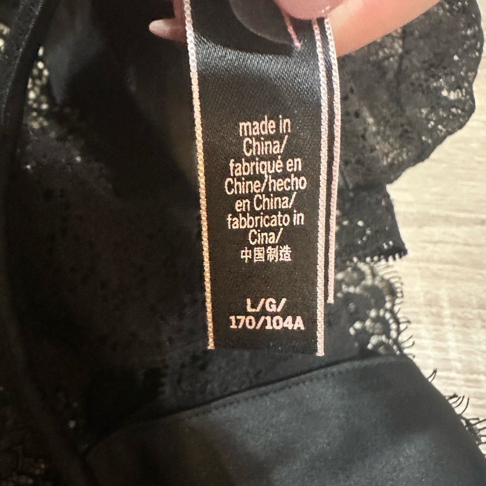 Victorias Secret Black Lace Thong Bodysuit. Size large.