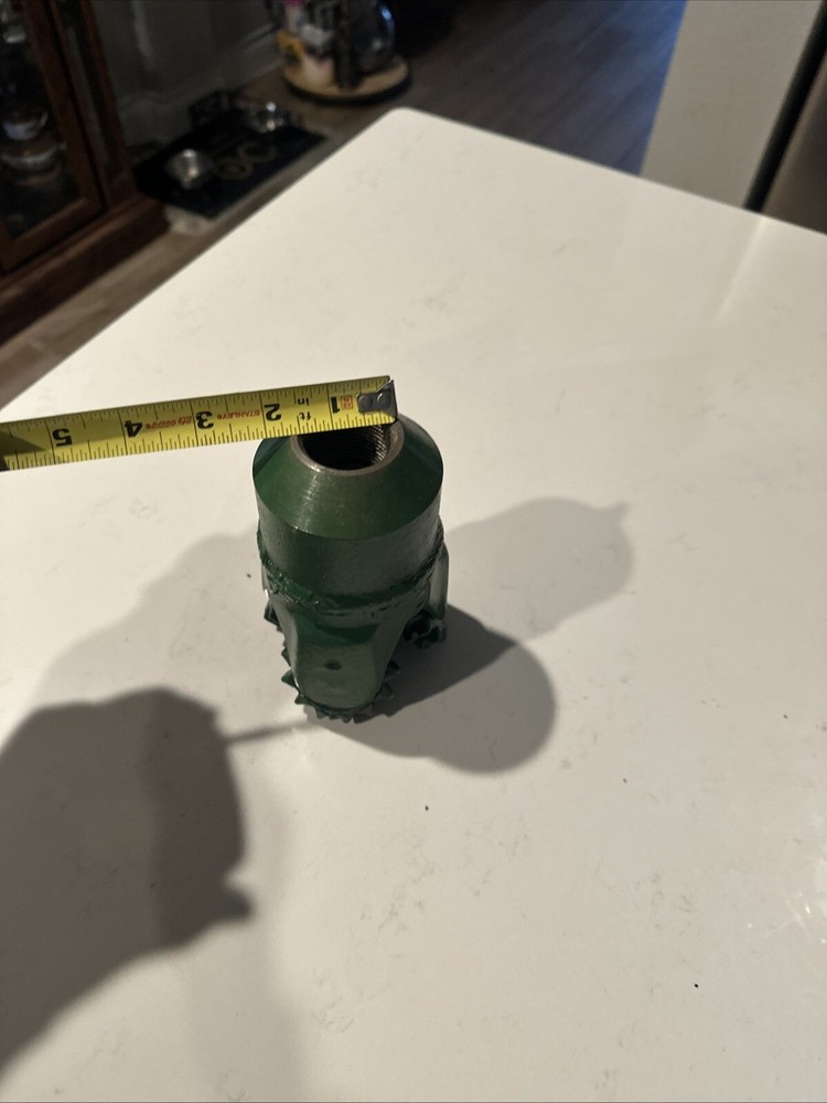 Tricone drill bit