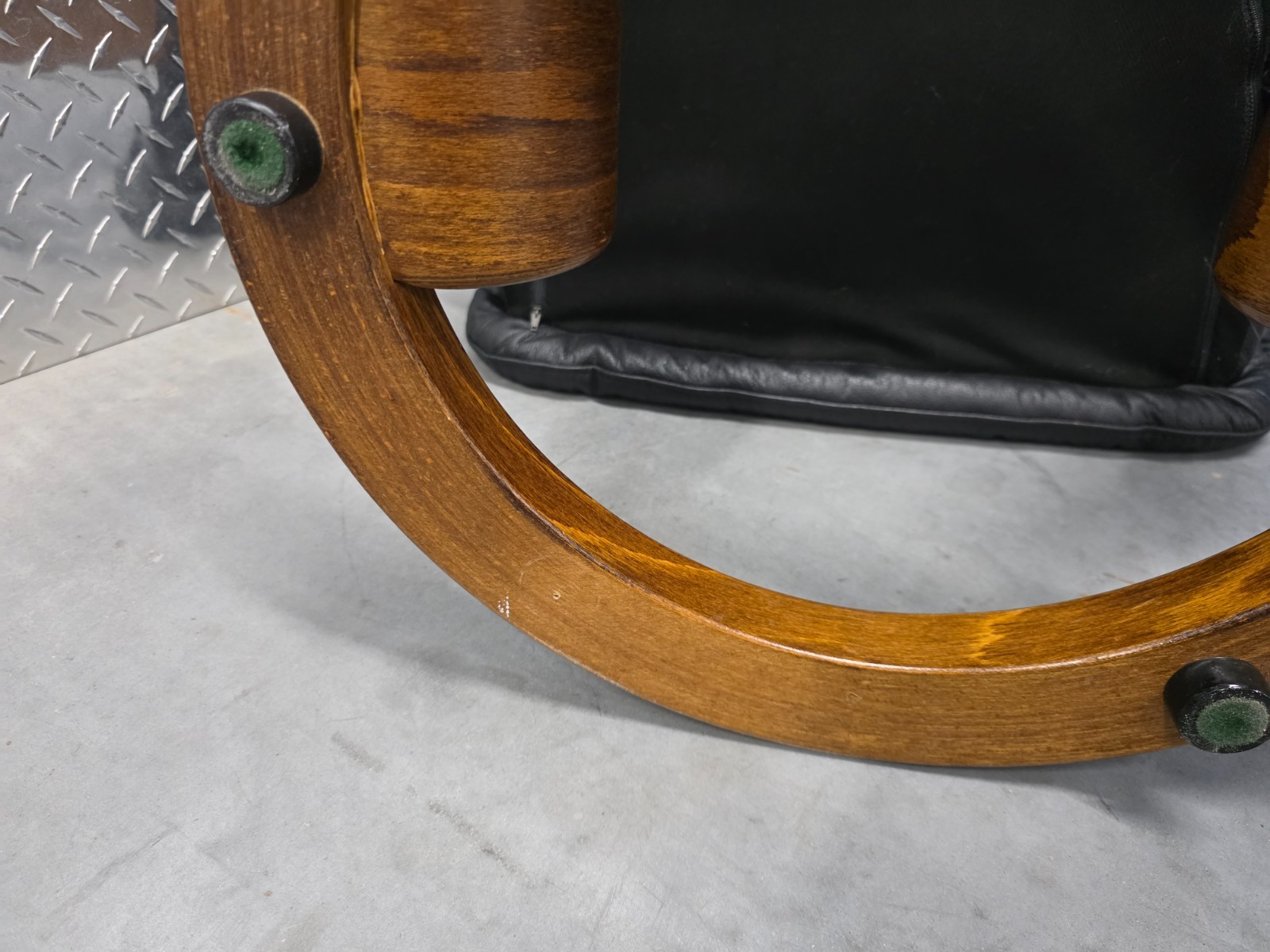 Ekornes Stressless Black Colored Leather Ottoman | Teak Stained Wood Base