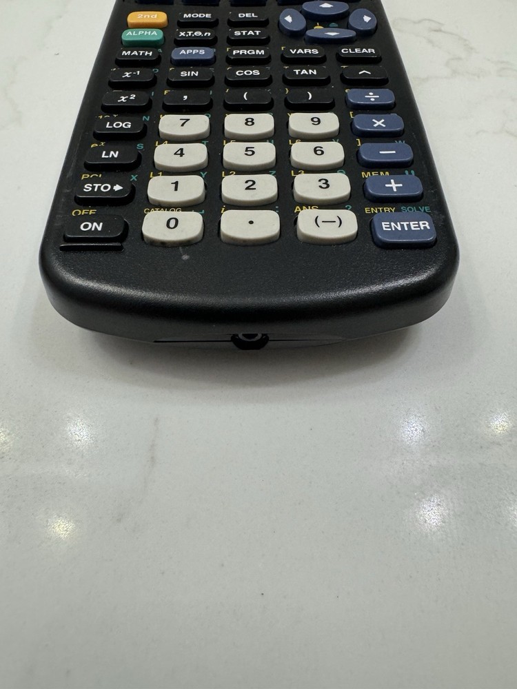 Texas Instruments TI-83 Handheld Graphing Calculator
