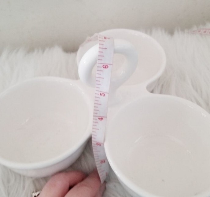 Condiment tray separated dishes.