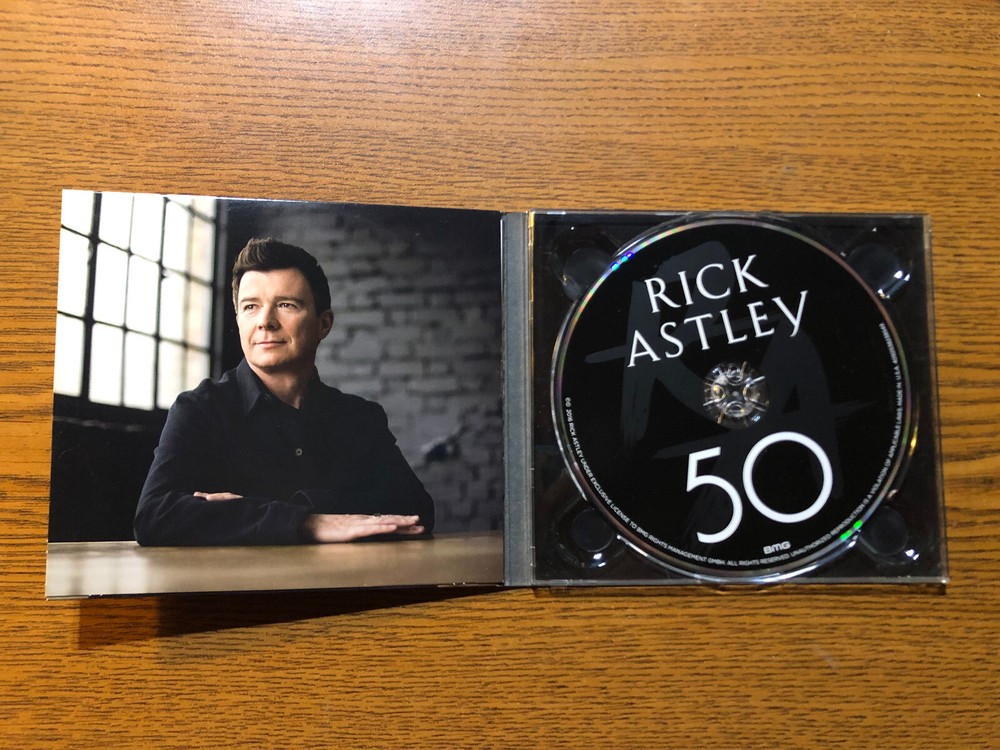 RICK ASTLEY signed 50 CD NEW NICE