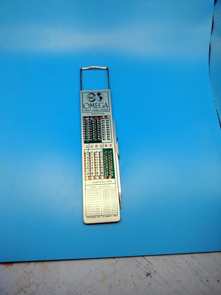 Vintage Omega Pocket Adding Machine , Collectible