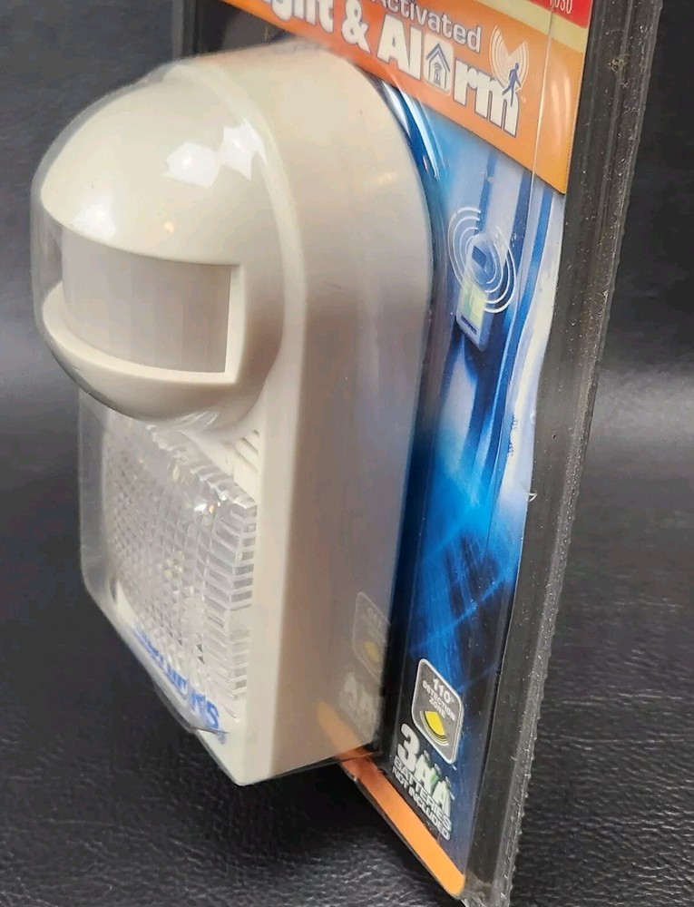 Wireless Motion Detection Brinks Light and Alarm Portable Battery Operated