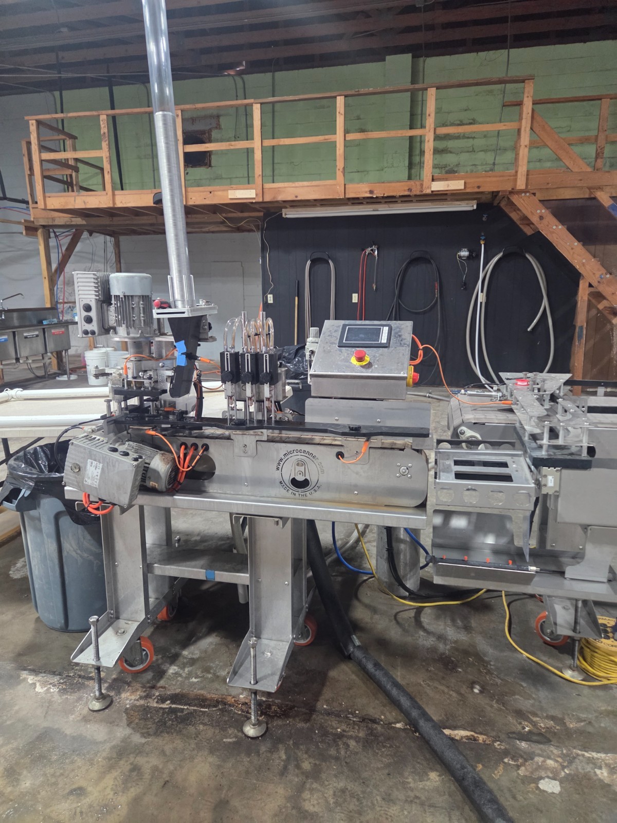 microcanner MC FLEX canning line with conveyor belt