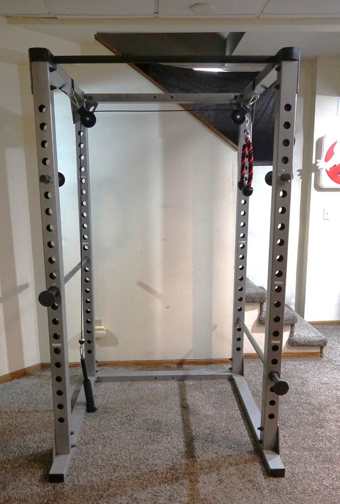 Body Solid power rack with pulley system for lifting weights - used