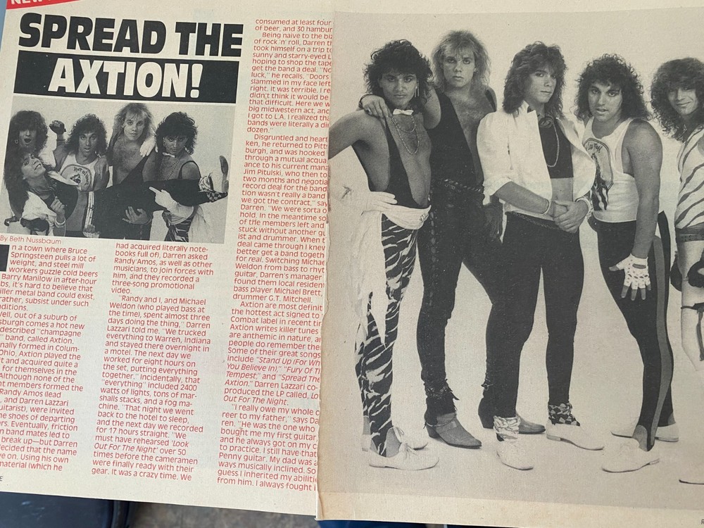 Axtion, Two Page Vintage Clipping