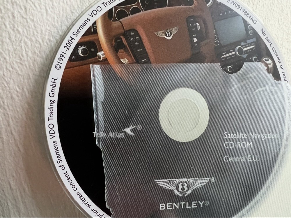 2004 Bentley Continental GT 7 Navigation Disc Set & Bentley Disc Case.