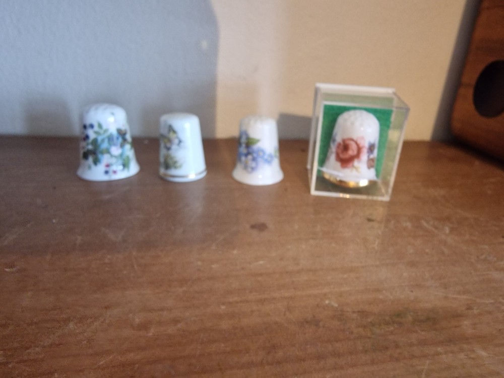 4 Floral themed thimbles