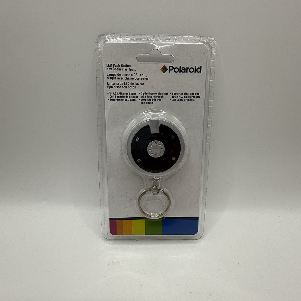 POLAROID LED PUSH BUTTON DISC KEY CHAIN FLASHLIGHT (31004)