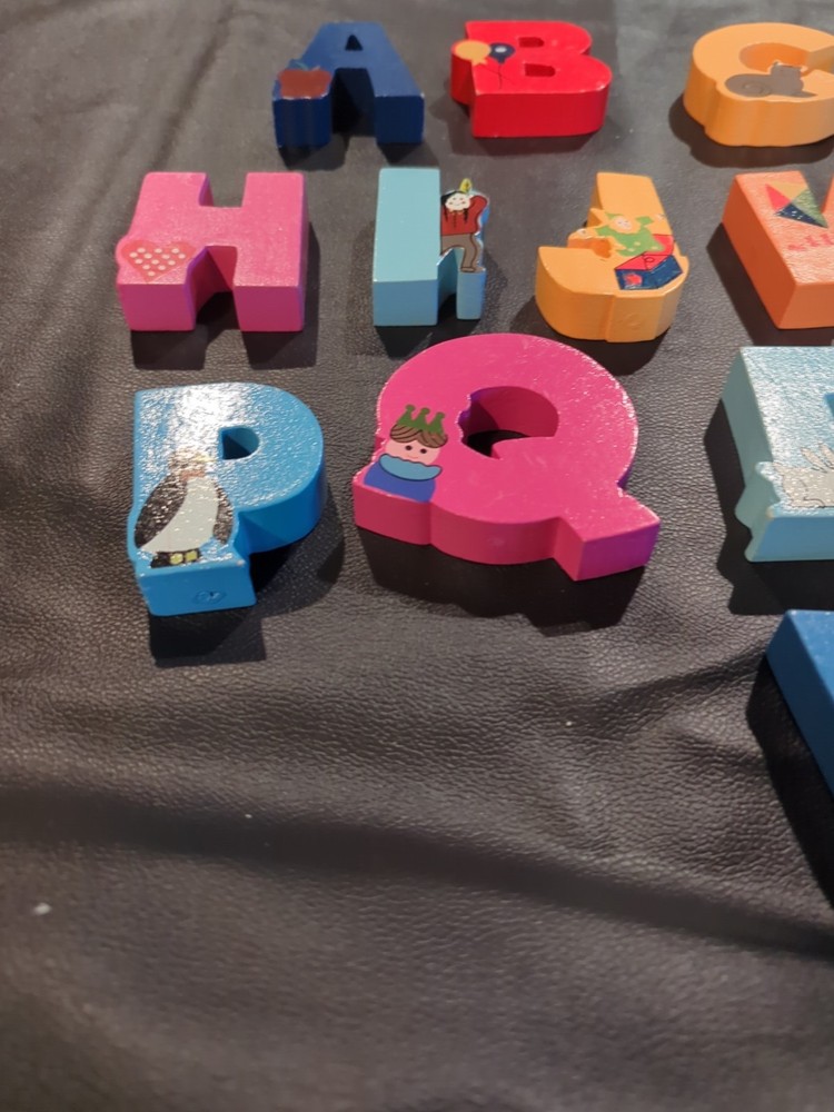 Solid wood alphabet letters in wood case