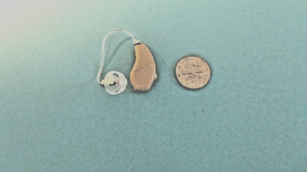 programmable DIGITAL RIC HEARING AID LEFT 4 programs ,2 MICS,noise reduction