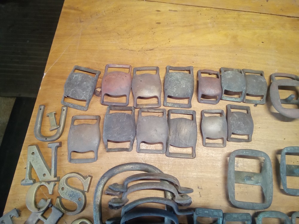 large assortment brass harness buckles