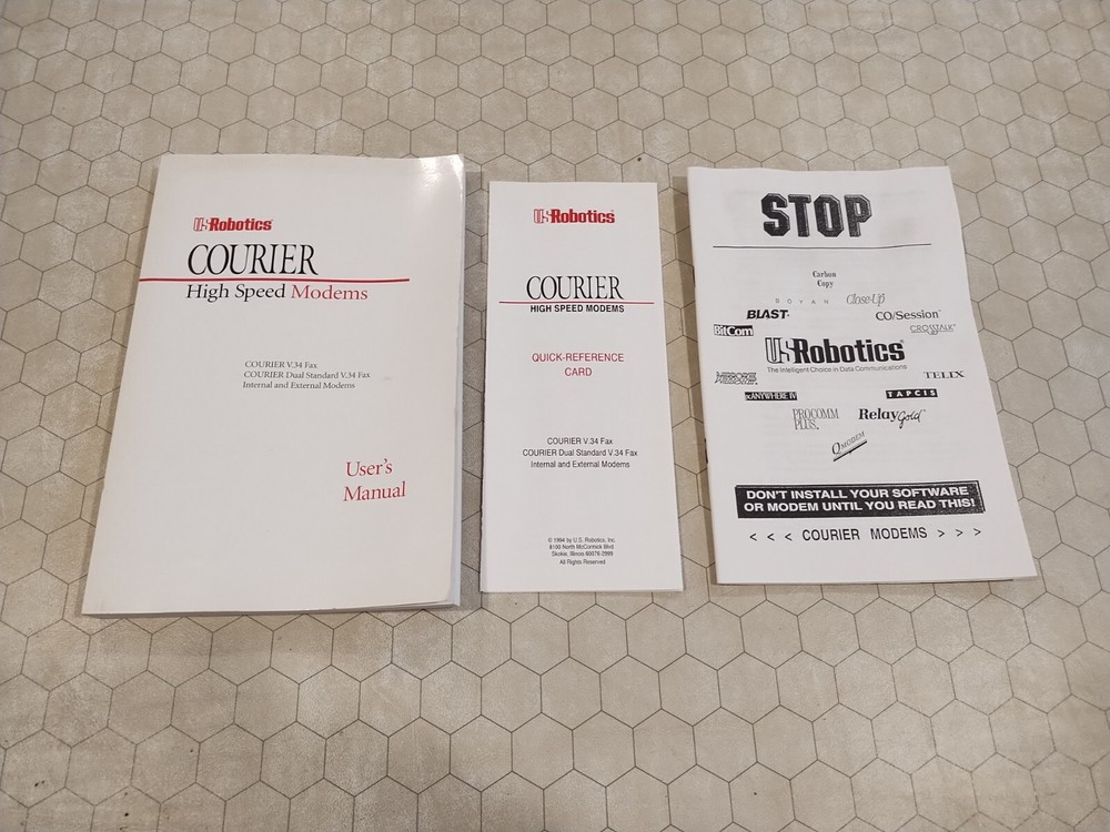 Courier Modem V.34 User's Manual/quick reference card, 1992-1994