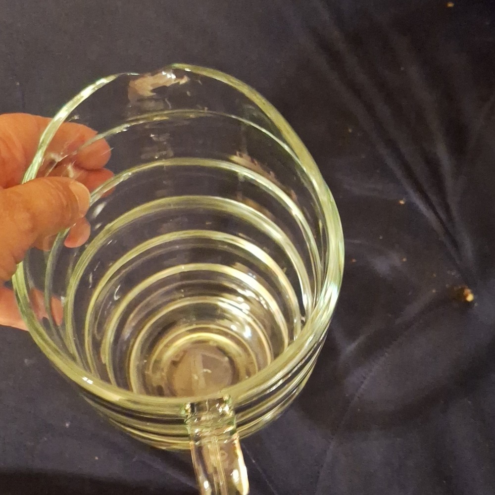 Clear Glass Pitcher Ribbed Design Round Shape Glossy Finish Solid Pattern Handle