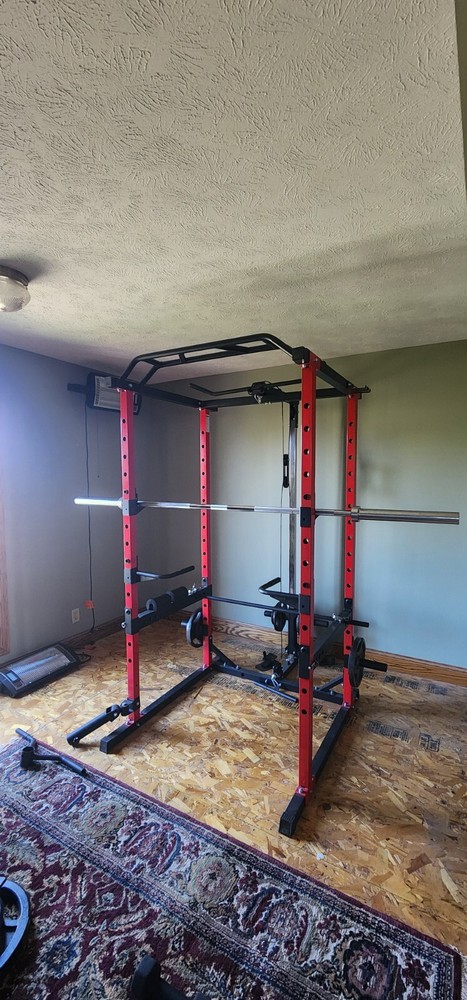 Used Red workout rack +bar+300lb plates
