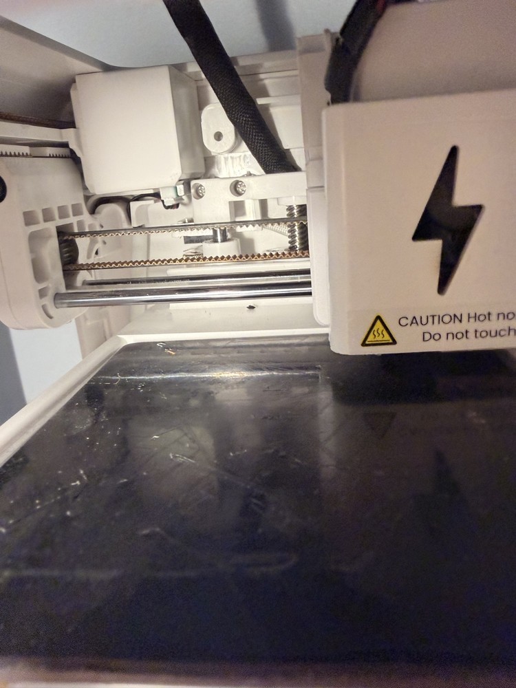 toybox 3d printer alpha 2 with power cable and accessories.