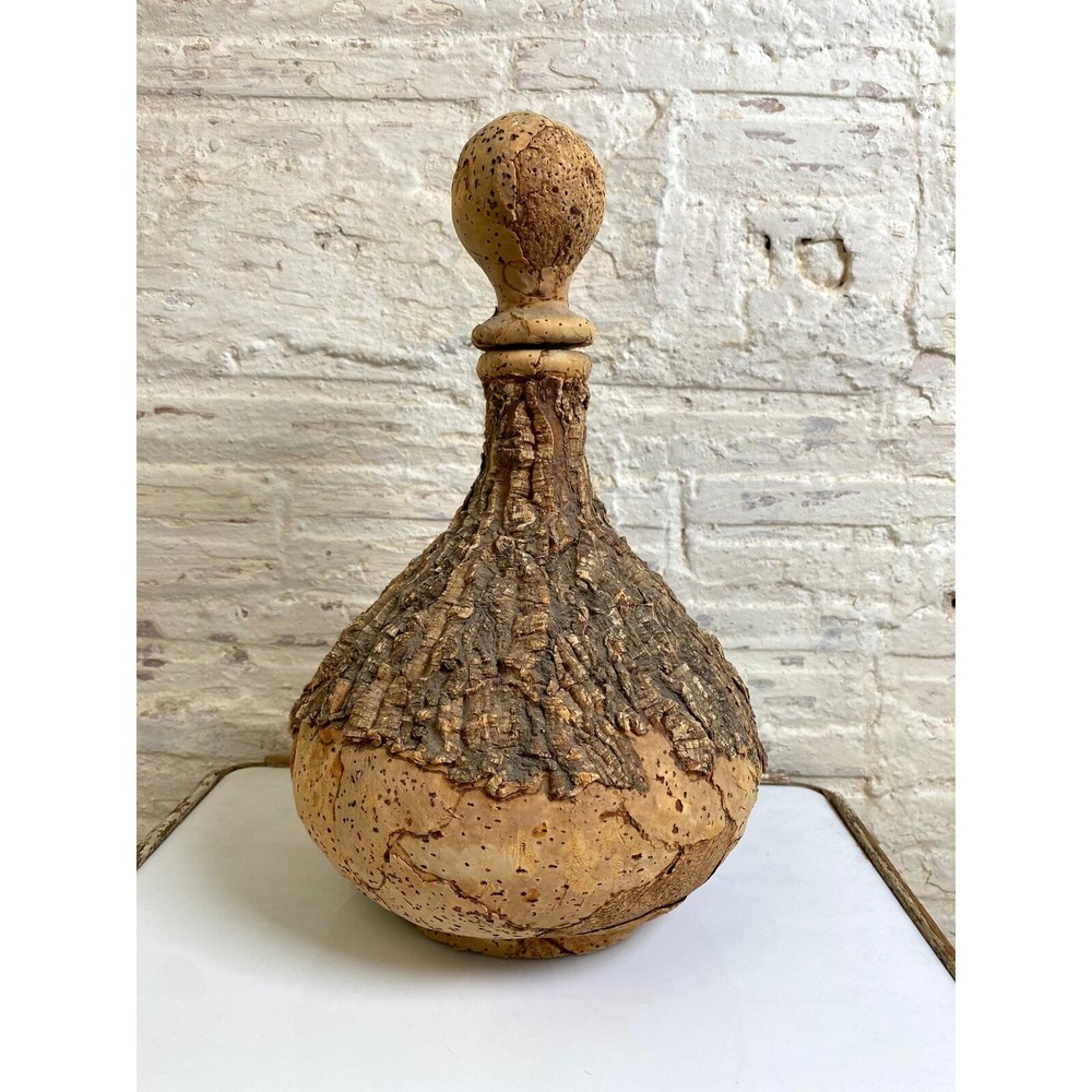 Glass Bottle covered in bark-like cork