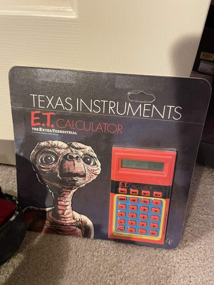 Vintage 1982 ET Calculator Texas Instruments Extra Terrestrial - never opened!