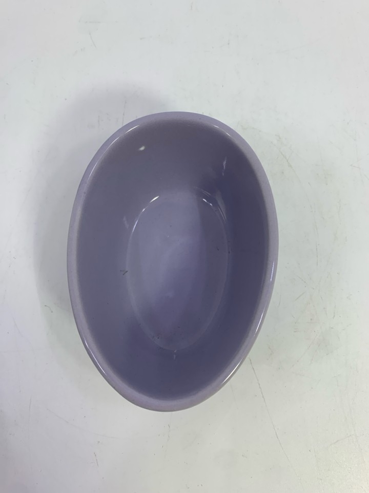 PURPLE EASTER EGG CUTOUT CANDY DISH.
