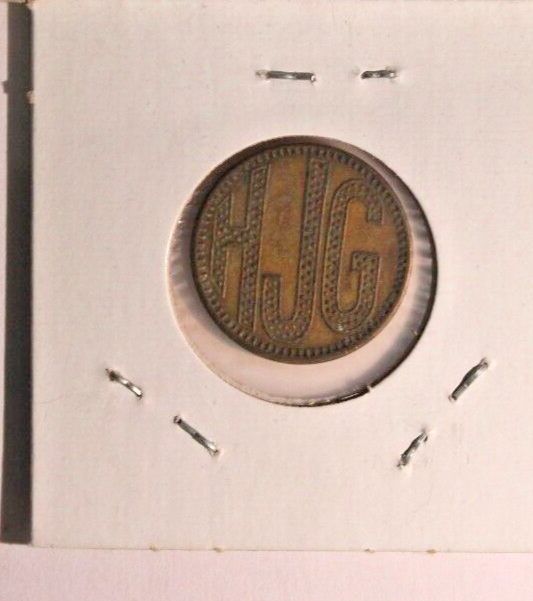 One Vintage Token HJG Slot machine token letters filled with dots, same both si