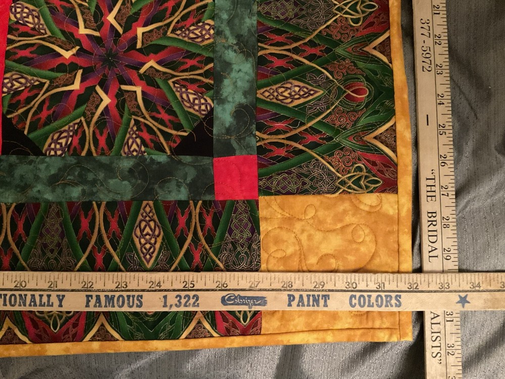 Pieced wall quilt machine embroidered