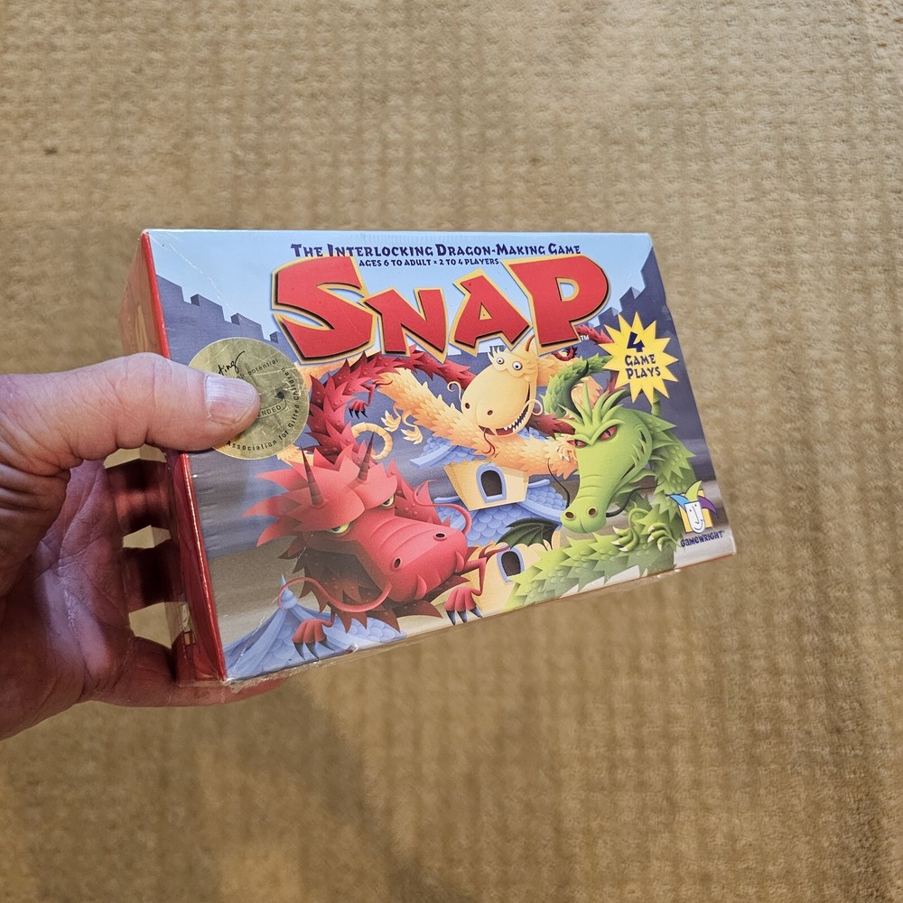 SNAP. Gamewright, Ages 6 and Up, 4 Games Interlocking Dragon Making Game- NICE!!