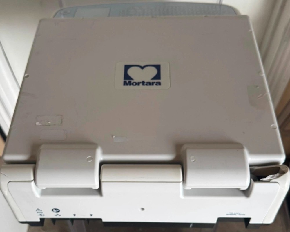 Mortara ECG Model ELI 380 Machine with leads And module .Read description