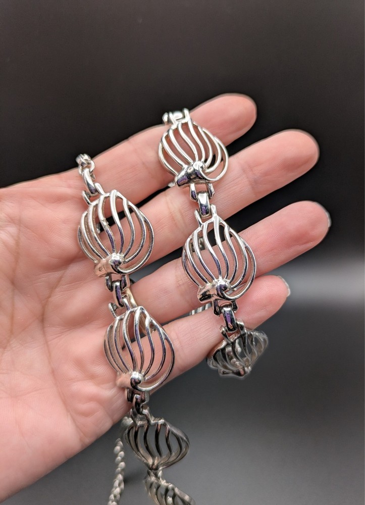 Silver-Toned Bracelet and Necklace Set Featuring Abstract Leaf Patterns