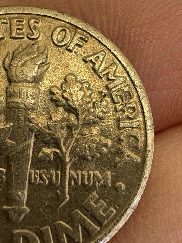 1992 P Roosevelt Dime Error. Struct through grease error.