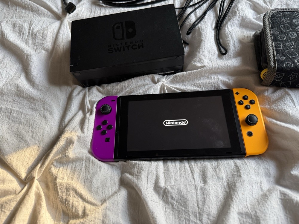 Nintendo Switch Bundle with Extra Joy-Con, Case, Dock, Cables, & Straps