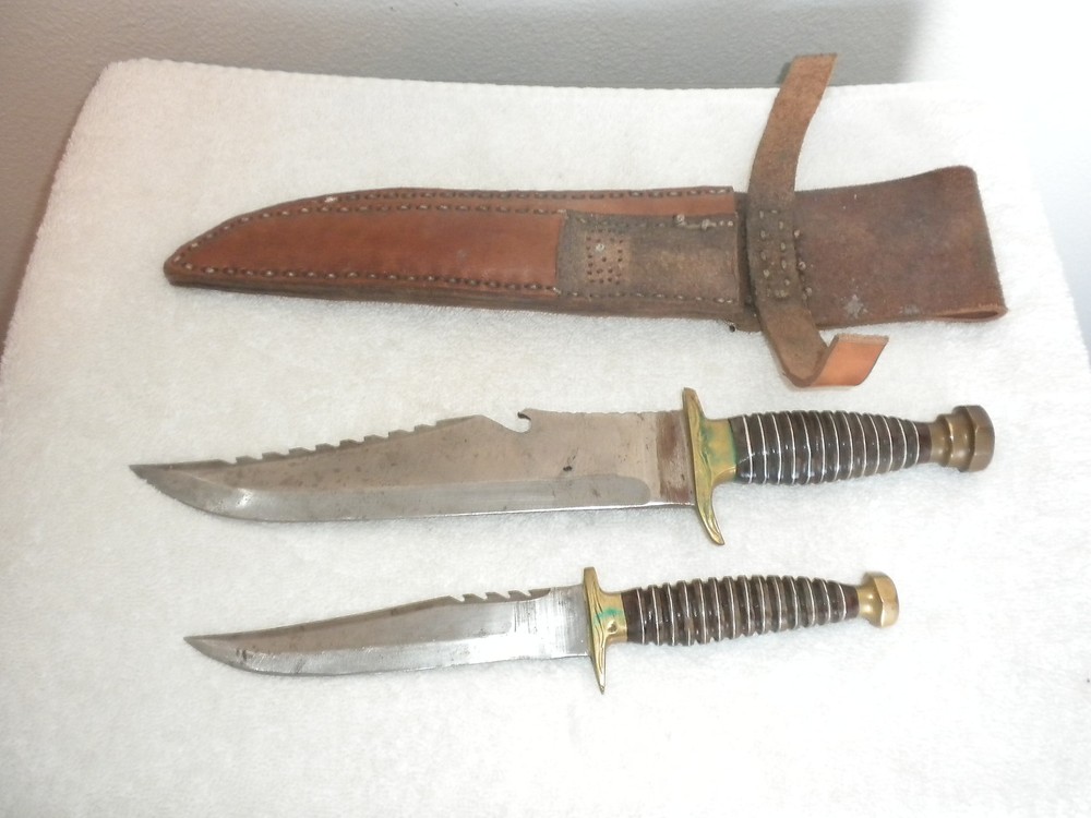 TWO KNIVES SAME DESIGN WITH LEATHER HOLDER