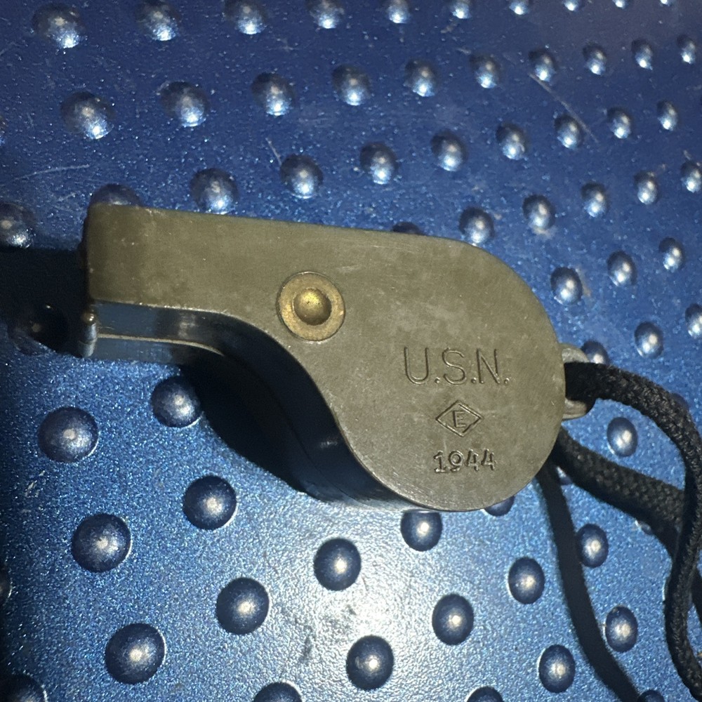 Vintage WW2 U.S. Navy 1944 dated OD Plastic Whistle with Black Lanyard Works