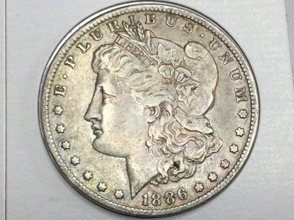 1886-O better dated Morgan Dollar in extra fine