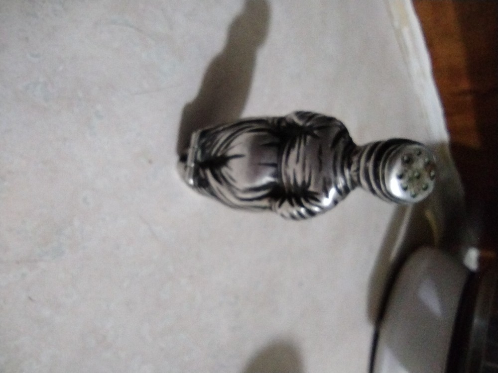 Antique salt or pepper shaker. Solid silver, dated around 1900. No dings.