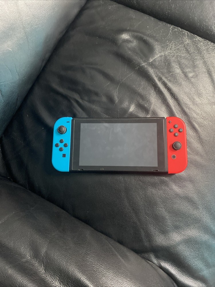 Nintendo Switch And Controller With Game