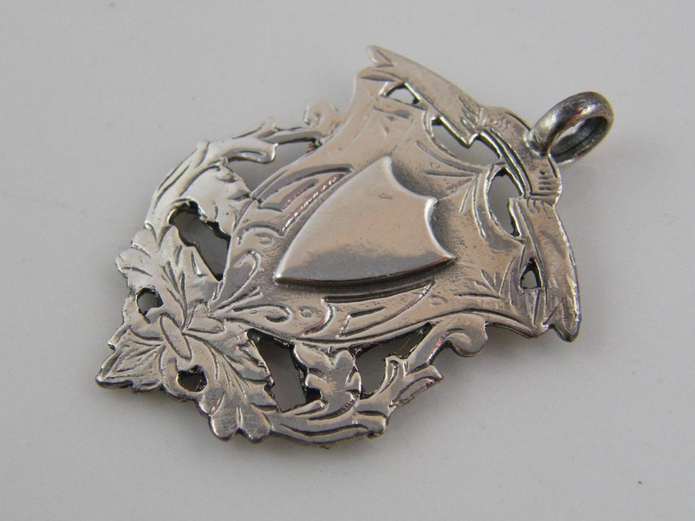 ENGRAVED STERLING SILVER SHIELD FOB