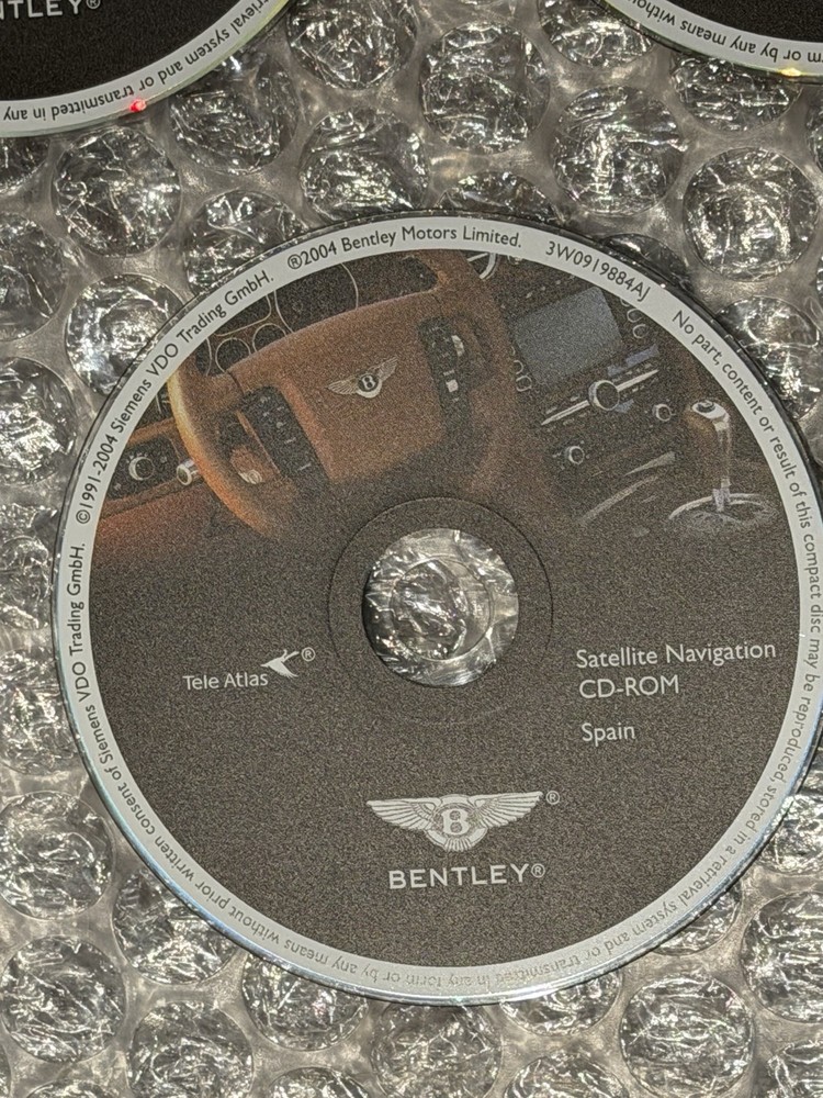 2004 Bentley Continental GT 7 Navigation Disc Set & Bentley Disc Case.