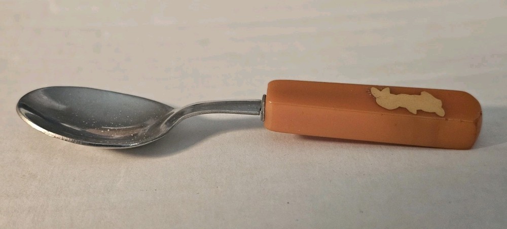 VINTAGE ORANGE BUTTERSCOTCH BAKELITE HANDLE BUNNY SPOON
